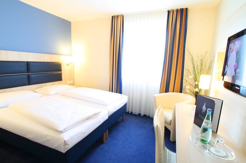 Hotel Roedelheimer Hof - Am Wasserturm Франкфурт на Майн Екстериор снимка