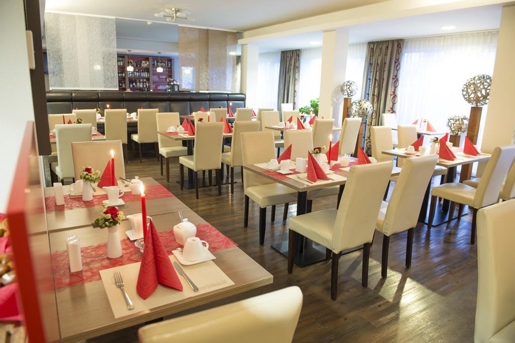 Hotel Roedelheimer Hof - Am Wasserturm Франкфурт на Майн Екстериор снимка