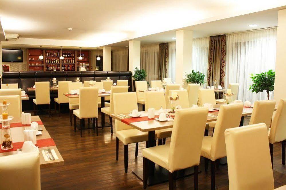Hotel Roedelheimer Hof - Am Wasserturm Франкфурт на Майн Екстериор снимка